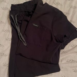 Jaanuu brand scrubs.